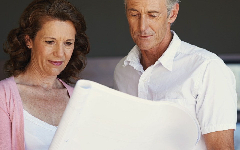 A couple looking over a document